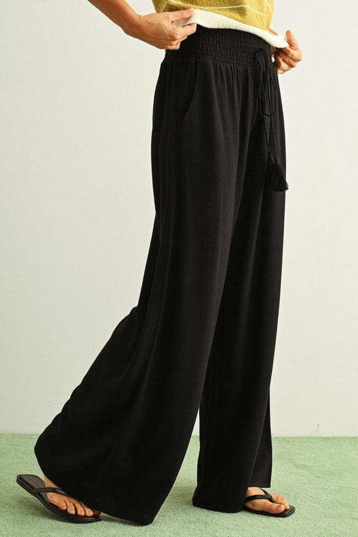 MIOU MUSE - Cotton Linen Smocked Waist Pants with Tassel in Black
