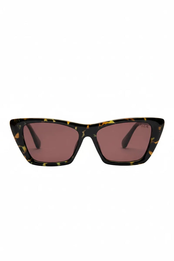 Cate with Tortoise Frames and Plum Polarized Lenses